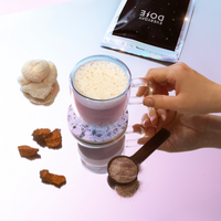 30 Serving of Mushroom Coffee with FREE Starter Kit and 1 FREE Mushroom Glass, showing prepared coffee and powder scoop.